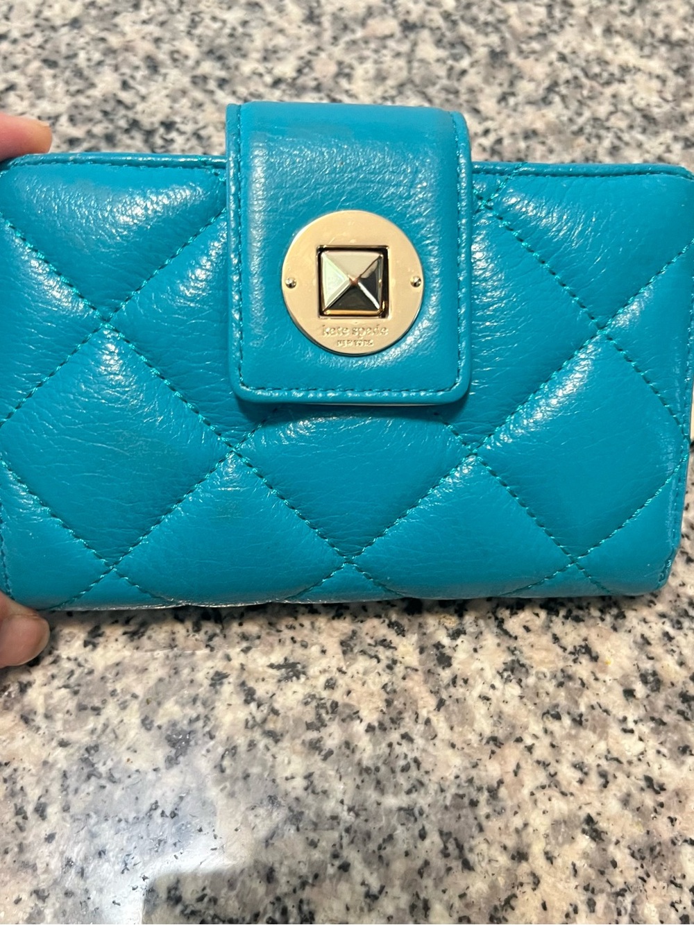 kate spade turquoise quilted leather wallet with gold-tone emblem